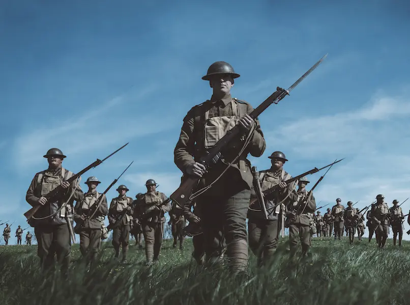 100 days to victory soldiers holding bayonets in a field