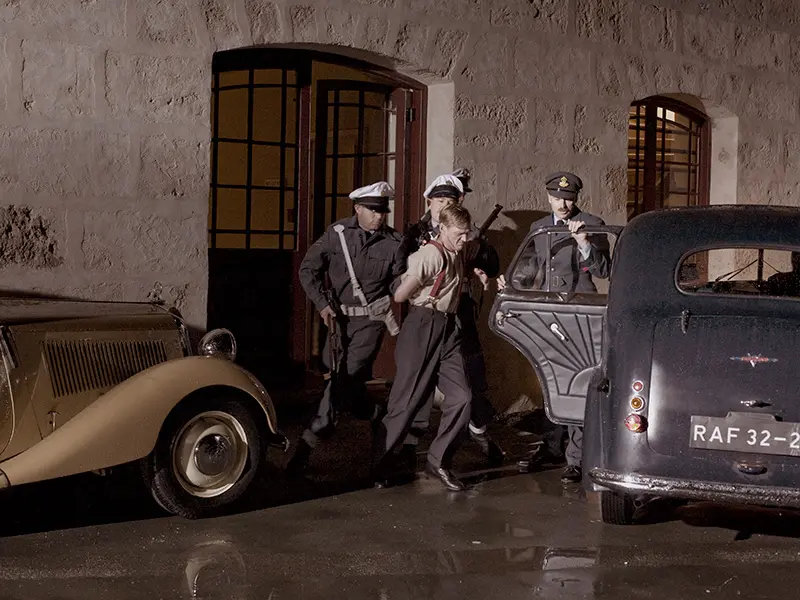 Actors recreate Great Escape 3 RAF Police in uniform arrest suspect
