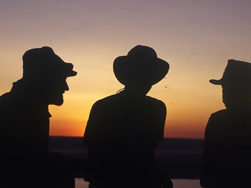Silhouette of Jack Jugarie, Rudiger Nehberg and Dave Covey at the end of the Human Race