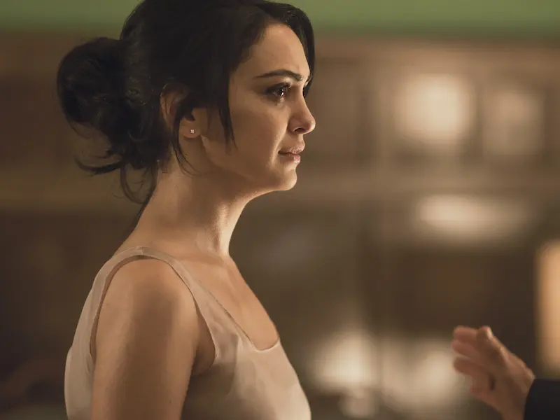 actor Nazanin Boniadi looking worried in feature film hotel mumbai
