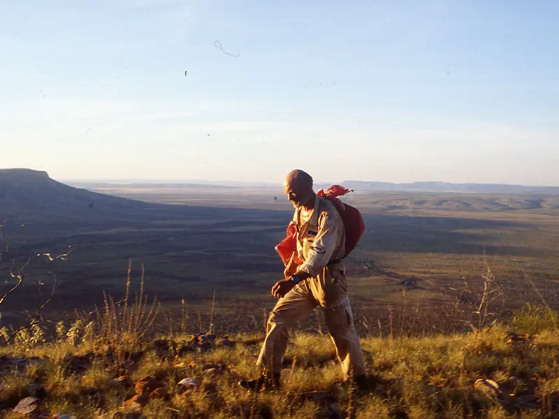 Rudiger Nehberg walking near Cockburn Range during the Human Race