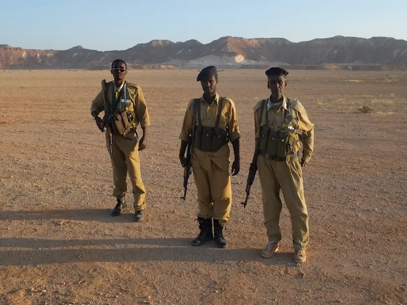 Three PMPF Soldiers in the desert of Puntland