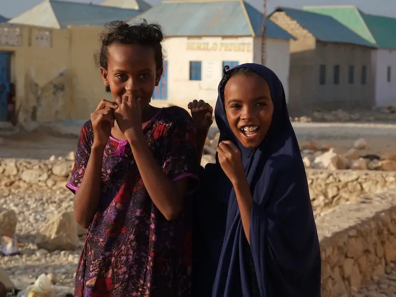 Two Somali Children standing in a street in Puntland