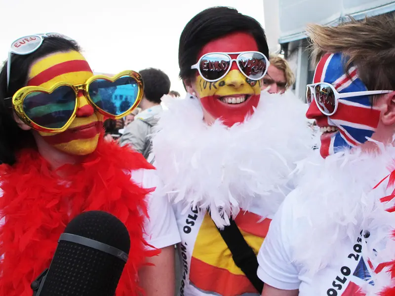 Colourful images of English and Spanish fans at Eurovision